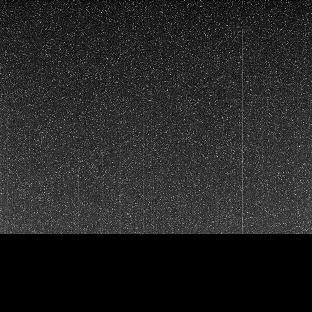 A dark, speckled square image, mostly black at the bottom where the transmission stopped