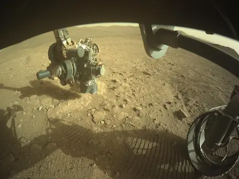 Raw image from Perseverance’s Front Hazard Avoidance Camera (Hazcam)