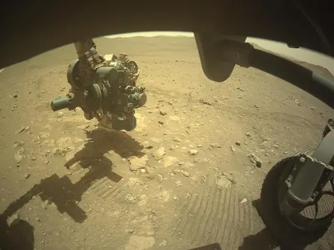Raw image from Perseverance’s Front Hazard Avoidance Camera (Hazcam), sol 2,000