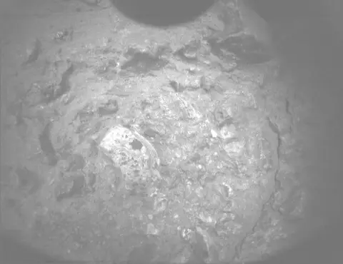 Raw image from Perseverance’s PIXL Micro Context Camera, sol 2,000